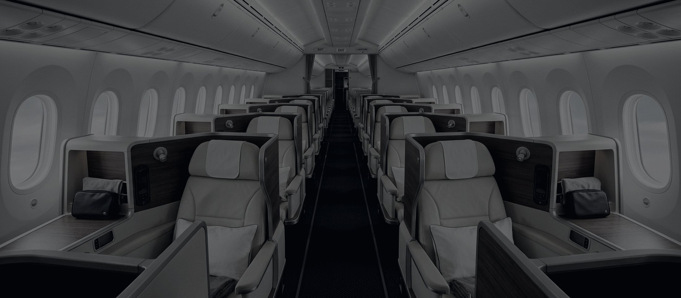 An empty business class cabin on a wide-body airliner